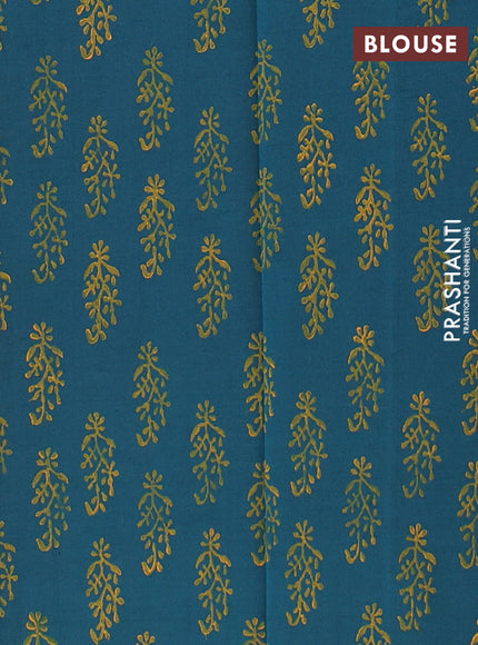 Semi silk cotton saree orange and peacock green with butta prints in borderless style