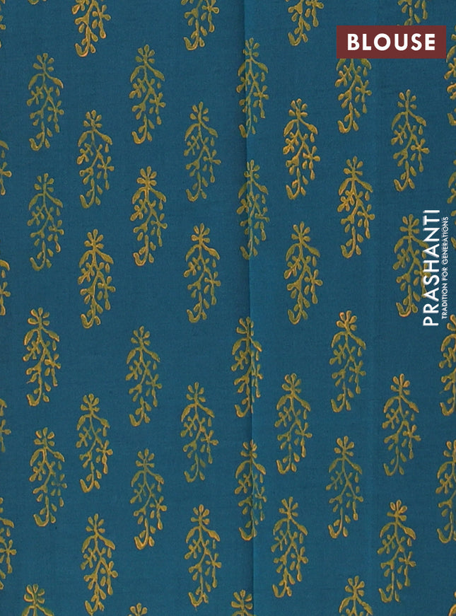 Semi silk cotton saree orange and peacock green with butta prints in borderless style