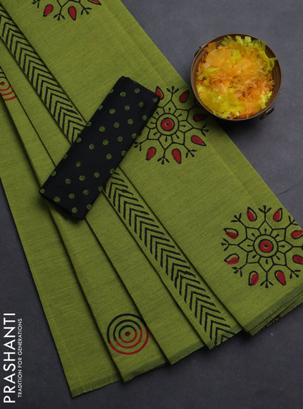 Semi silk cotton saree light green and black with butta prints in borderless style