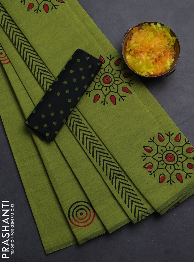 Semi silk cotton saree light green and black with butta prints in borderless style
