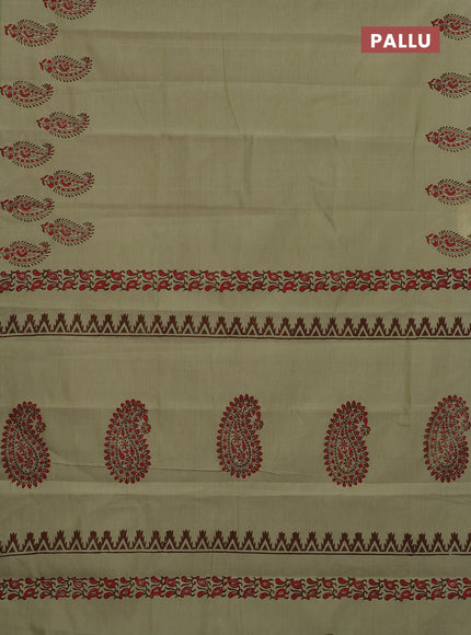 Semi silk cotton saree pista green and brown with butta prints and printed border