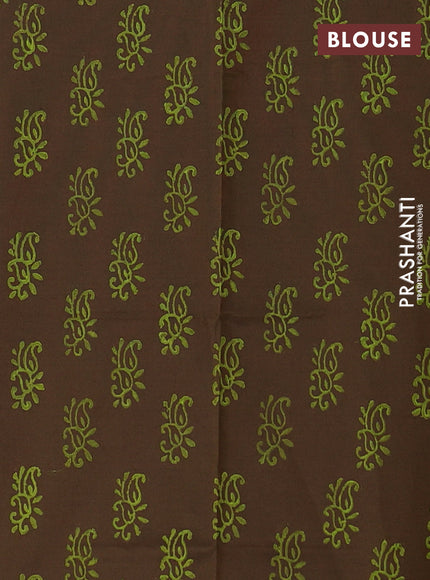 Semi silk cotton saree pista green and brown with butta prints and printed border