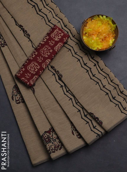 Semi silk cotton saree beige and maroon with elephant butta prints in borderless style