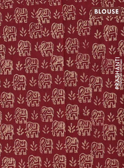 Semi silk cotton saree beige and maroon with elephant butta prints in borderless style