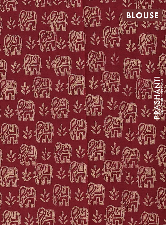Semi silk cotton saree beige and maroon with elephant butta prints in borderless style