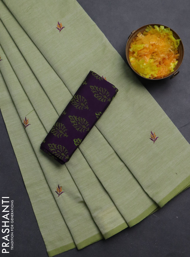 Semi silk cotton saree pista green and deep purple with embroided buttas in borderless style