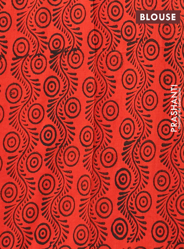 Semi silk cotton saree green and reddish orange with embroided buttas in borderless style