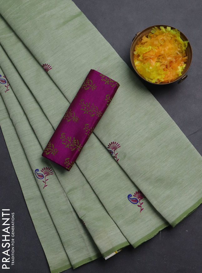 Semi silk cotton saree pastel green and magenta pink with embroided buttas in borderless style