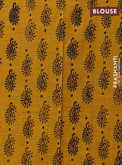 Semi silk cotton saree black and mustard shade with embroided buttas in borderless style