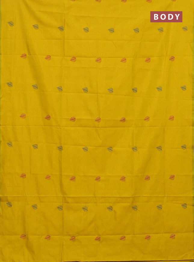 Semi silk cotton saree yellow and peacock green with embroided buttas in borderless style