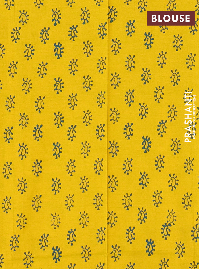 Semi silk cotton saree peacock green and yellow with embroided buttas in borderless style