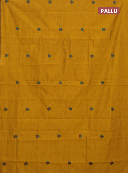 Semi silk cotton saree mustard yellow and green with embroided buttas in borderless style