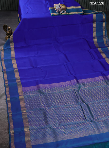 Kanchipuram silk saree blue and dual shade of teal green with plain body and rettapet zari woven border