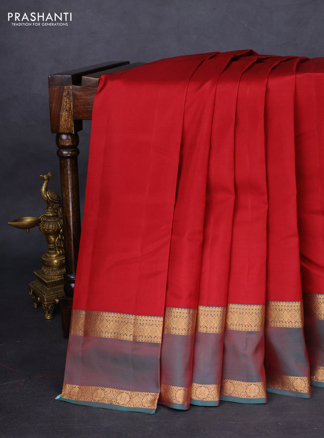 Kanchipuram silk saree maroon and dual shade of teal green with plain body and rettapet zari woven border