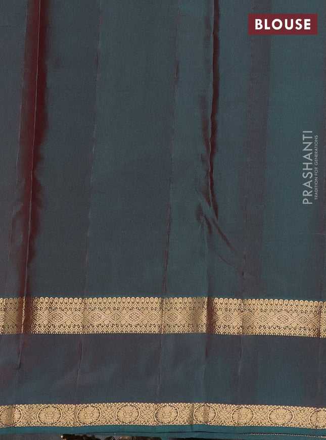 Kanchipuram silk saree maroon and dual shade of teal green with plain body and rettapet zari woven border