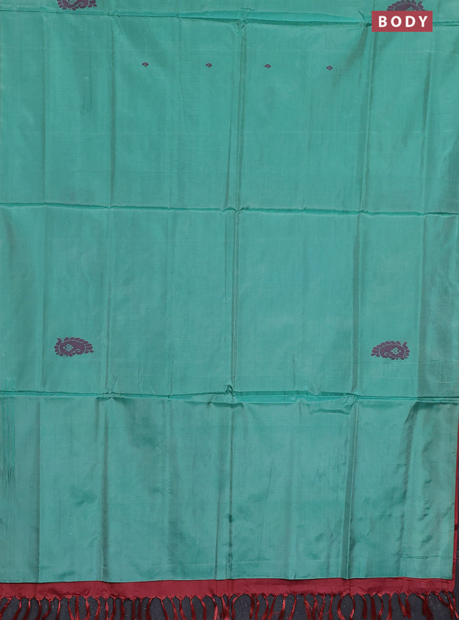 Banana pith saree teal green shade and maroon with thread woven buttas in borderless style