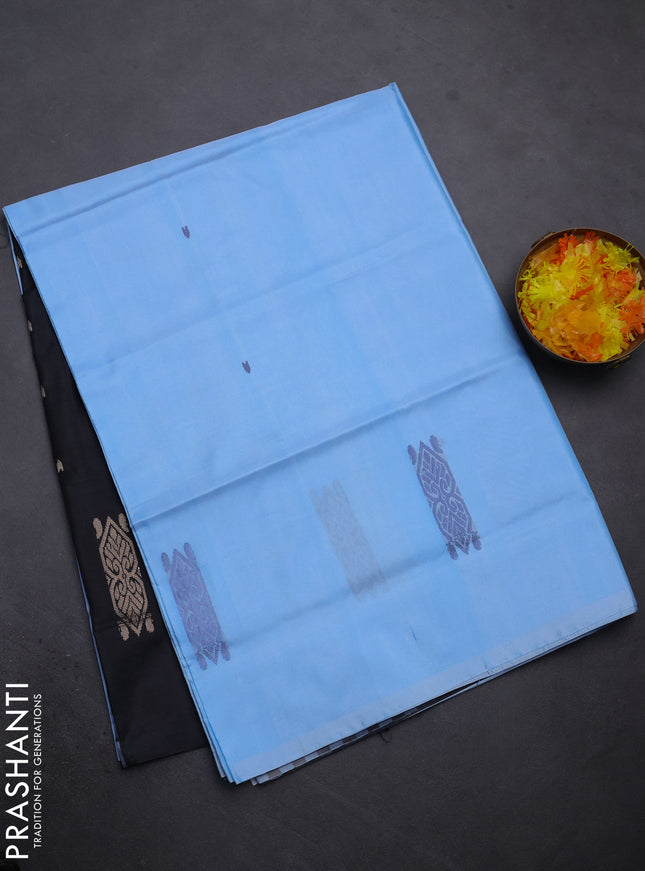 Banana pith saree light blue and black with thread woven buttas in borderless style