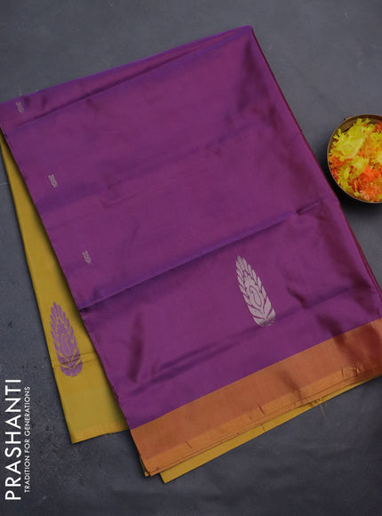 Banana pith saree dual shade of purple and mustard yellow with thread woven buttas and contrast border