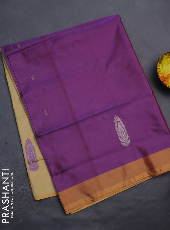 Banana pith saree dual shade of purple and yellow with thread woven buttas and contrast border