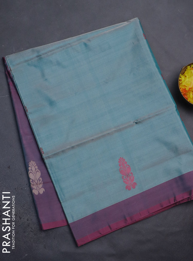 Banana pith saree teal green shade and dual shade of magenta pink with thread woven buttas in borderless style