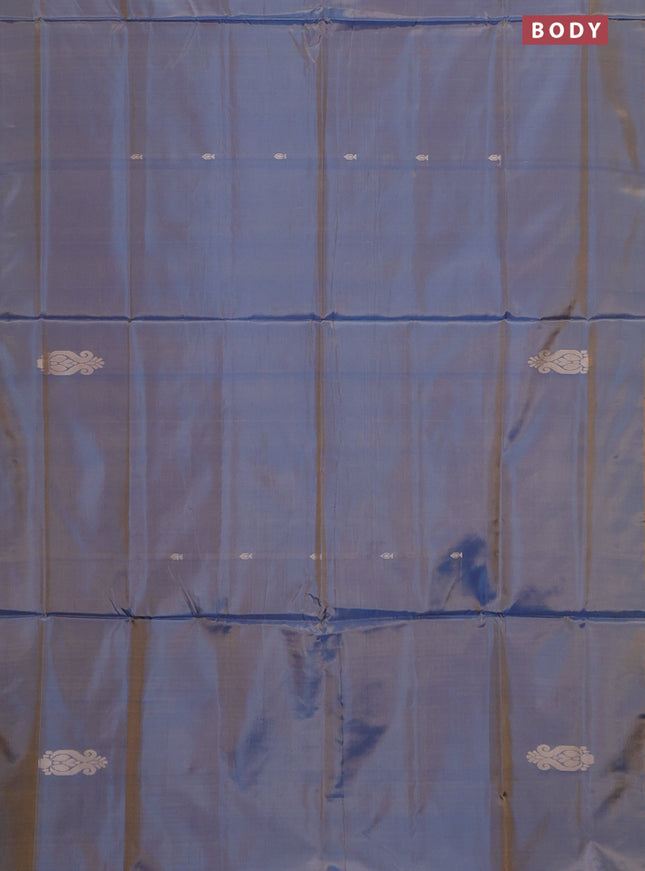 Banana pith saree dual shade of bluish rust and deep purple with thread woven buttas in borderless style