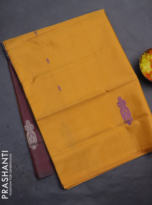 Banana pith saree mango yellow and maroon with thread woven buttas in borderless style