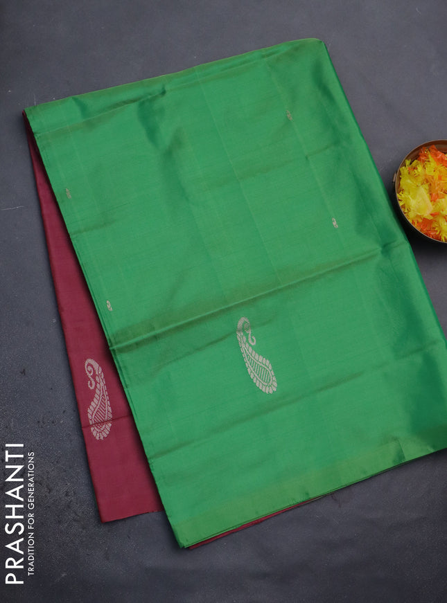 Banana pith saree green and maroon with thread woven buttas in borderless style