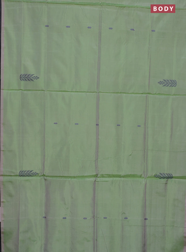 Banana pith saree dual shade of light green and black with thread woven buttas in borderless style