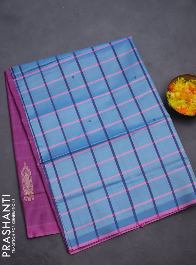 Banana pith saree blue shade and purple with allover checked pattern and piping border