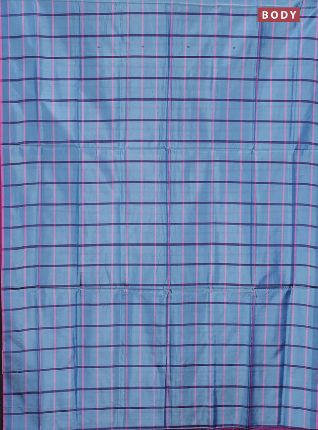 Banana pith saree blue shade and purple with allover checked pattern and piping border