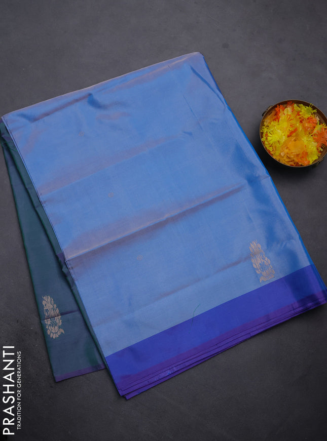 Banana pith saree blue shade and dual shade of greenish violet with thread woven buttas and contrast border
