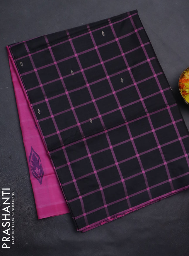 Banana pith saree black and pink with allover checked pattern and piping border