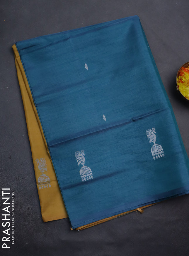 Banana pith saree teal blue and dark mustard with thread woven buttas in borderless style