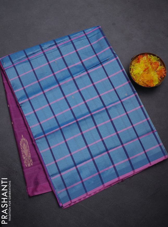 Banana pith saree blue and magenta pink with allover checked pattern and piping border