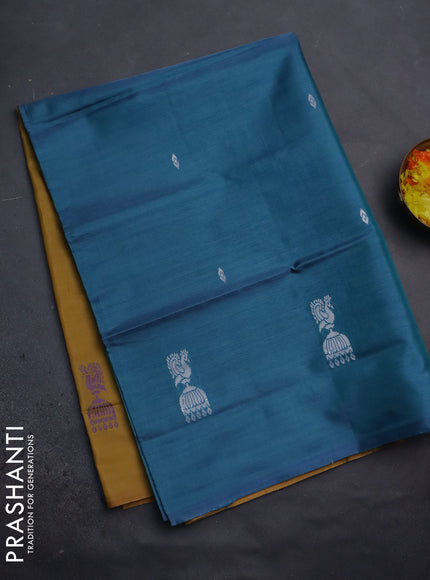 Banana pith saree teal blue and dark mustard with thread woven buttas in borderless style
