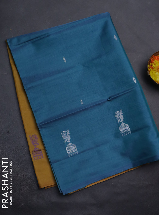 Banana pith saree teal blue and dark mustard with thread woven buttas in borderless style