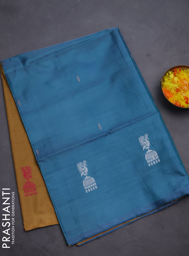Banana pith saree blue and dark mustard with thread woven buttas in borderless style
