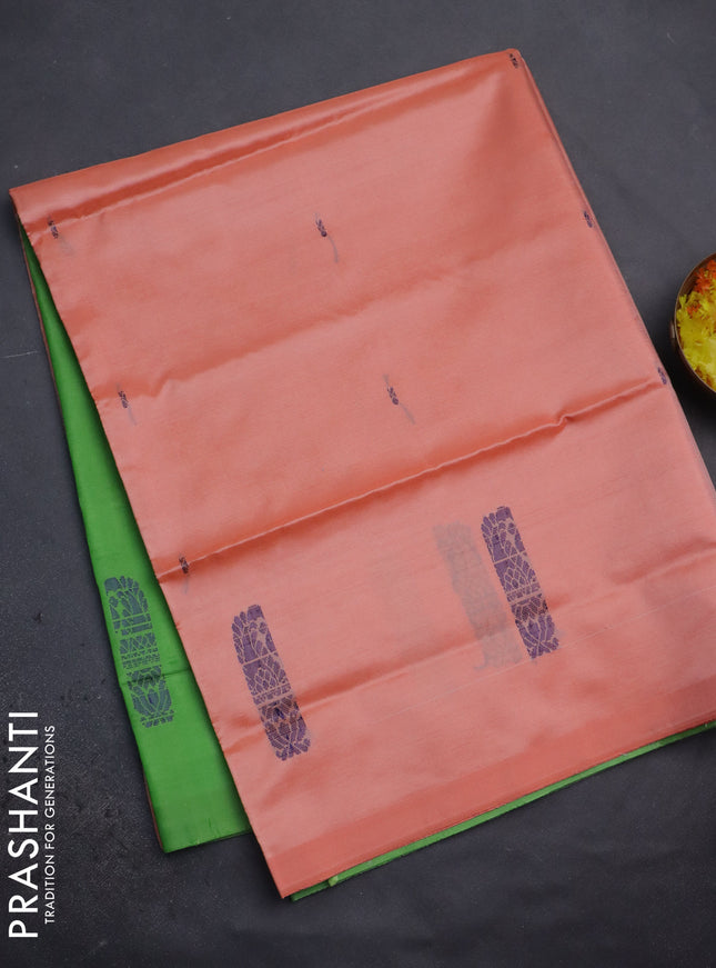 Banana pith saree peach orange and light green with thread woven buttas in borderless style
