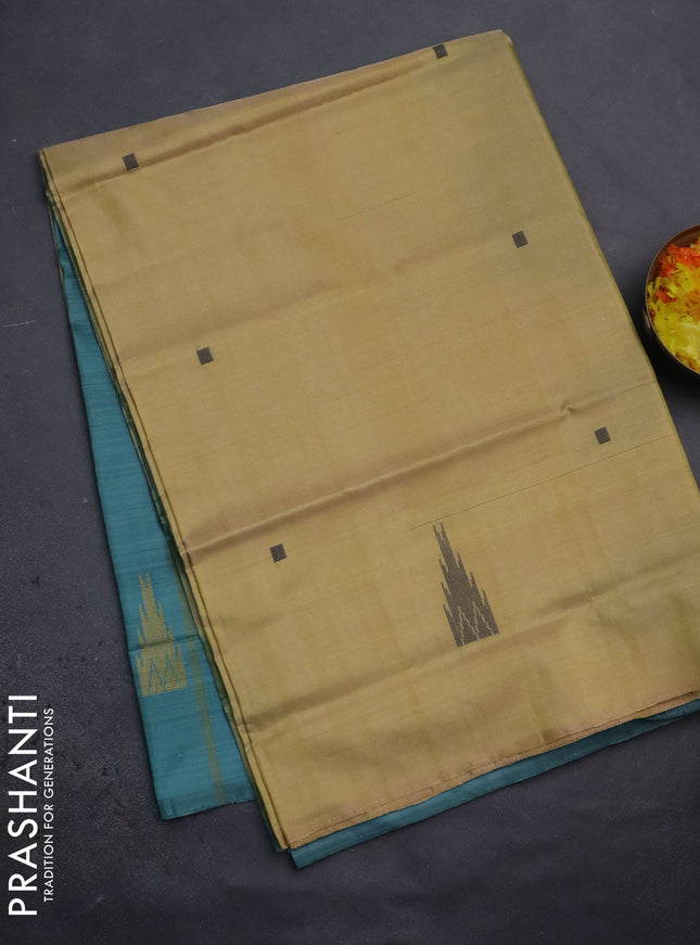 Banana pith saree pale yellow and teal green shade with thread woven buttas in borderless style