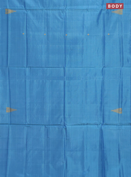 Banana pith saree cs blue and sandal with thread woven buttas in borderless style