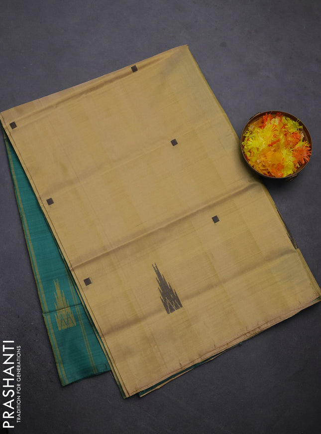 Banana pith saree sandal and teal green with thread woven buttas in borderless style