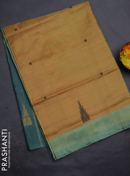 Banana pith saree mustard yellow and peacock green with thread woven buttas and contrast border