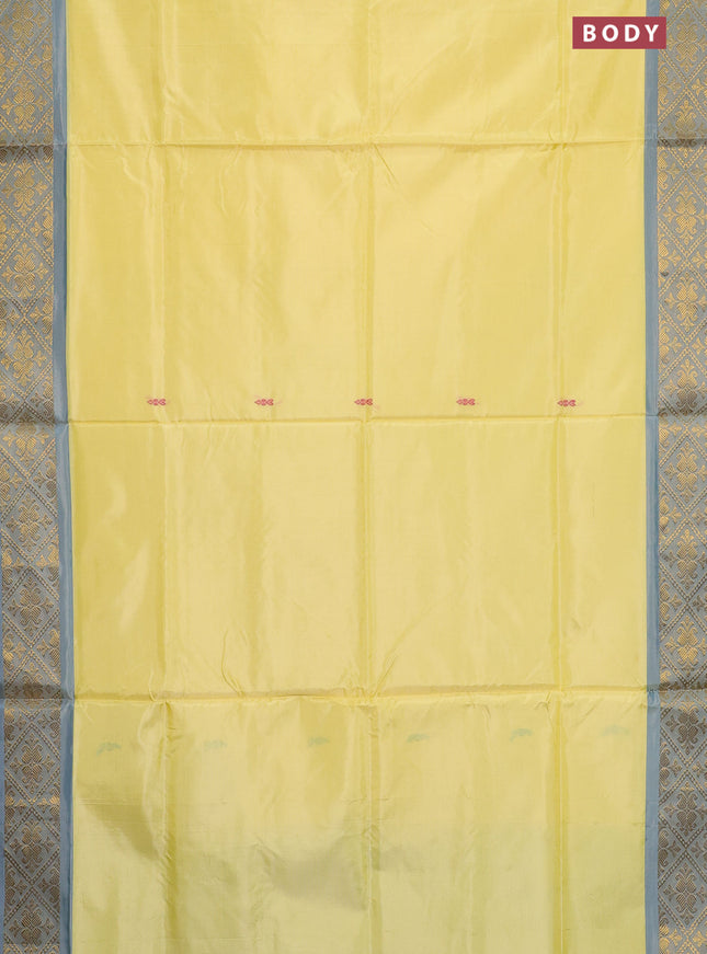 Banana pith saree pale yellow and cs blue with thread woven buttas and zari woven border