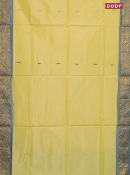 Banana pith saree pale yellow and green with thread woven buttas and zari woven border