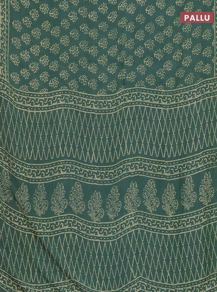 Semi pashmina silk saree green and cream with allover floral butta prints and crocia lace work border
