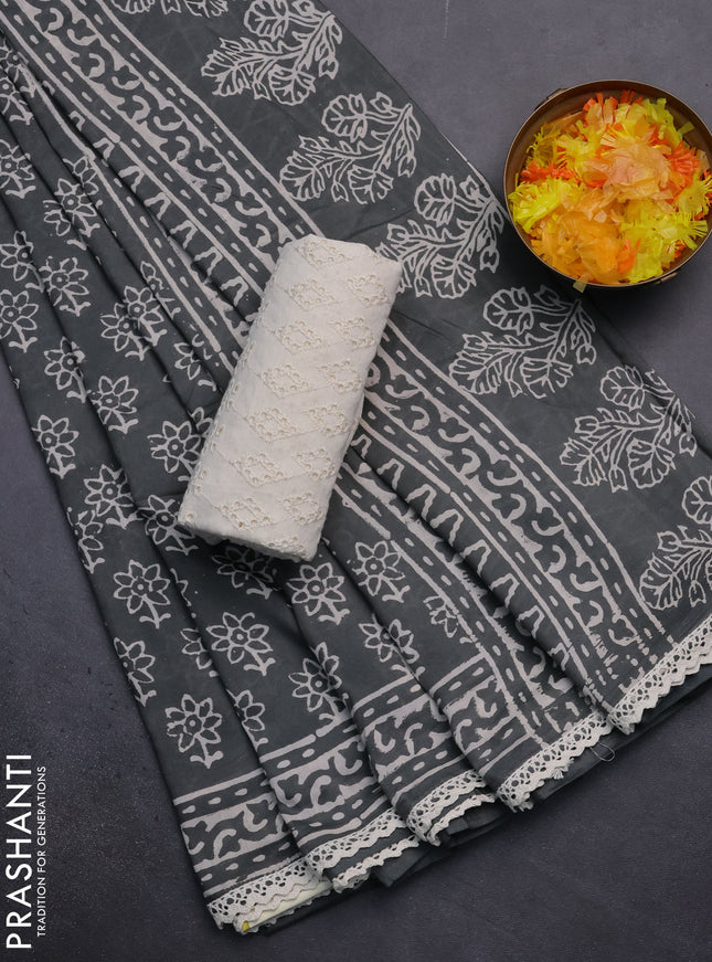 Semi pashmina silk saree grey and cream with allover floral butta prints and crocia lace work border
