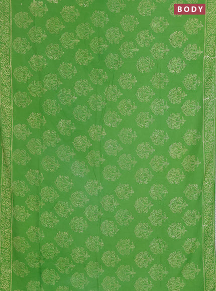 Semi pashmina silk saree light green and cream with allover floral butta prints and crocia lace work border