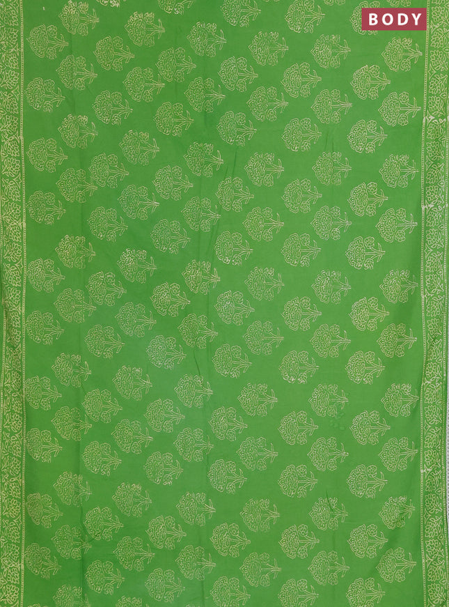 Semi pashmina silk saree light green and cream with allover floral butta prints and crocia lace work border