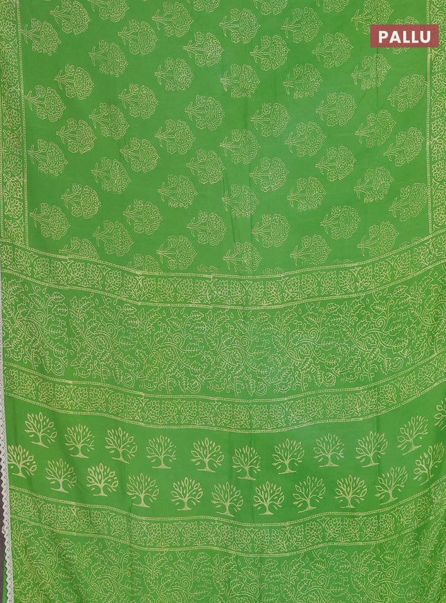 Semi pashmina silk saree light green and cream with allover floral butta prints and crocia lace work border