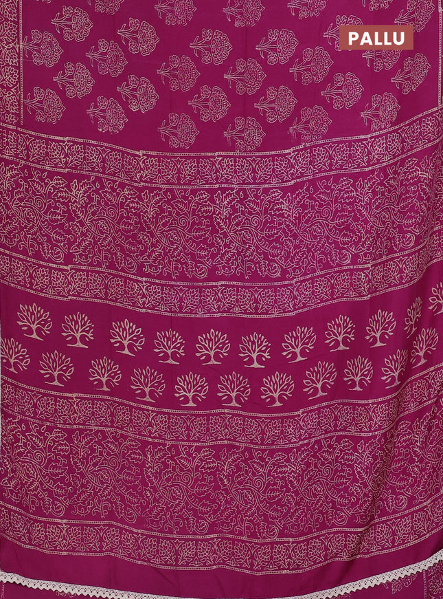 Semi pashmina silk saree purple and cream with allover floral butta prints and crocia lace work border